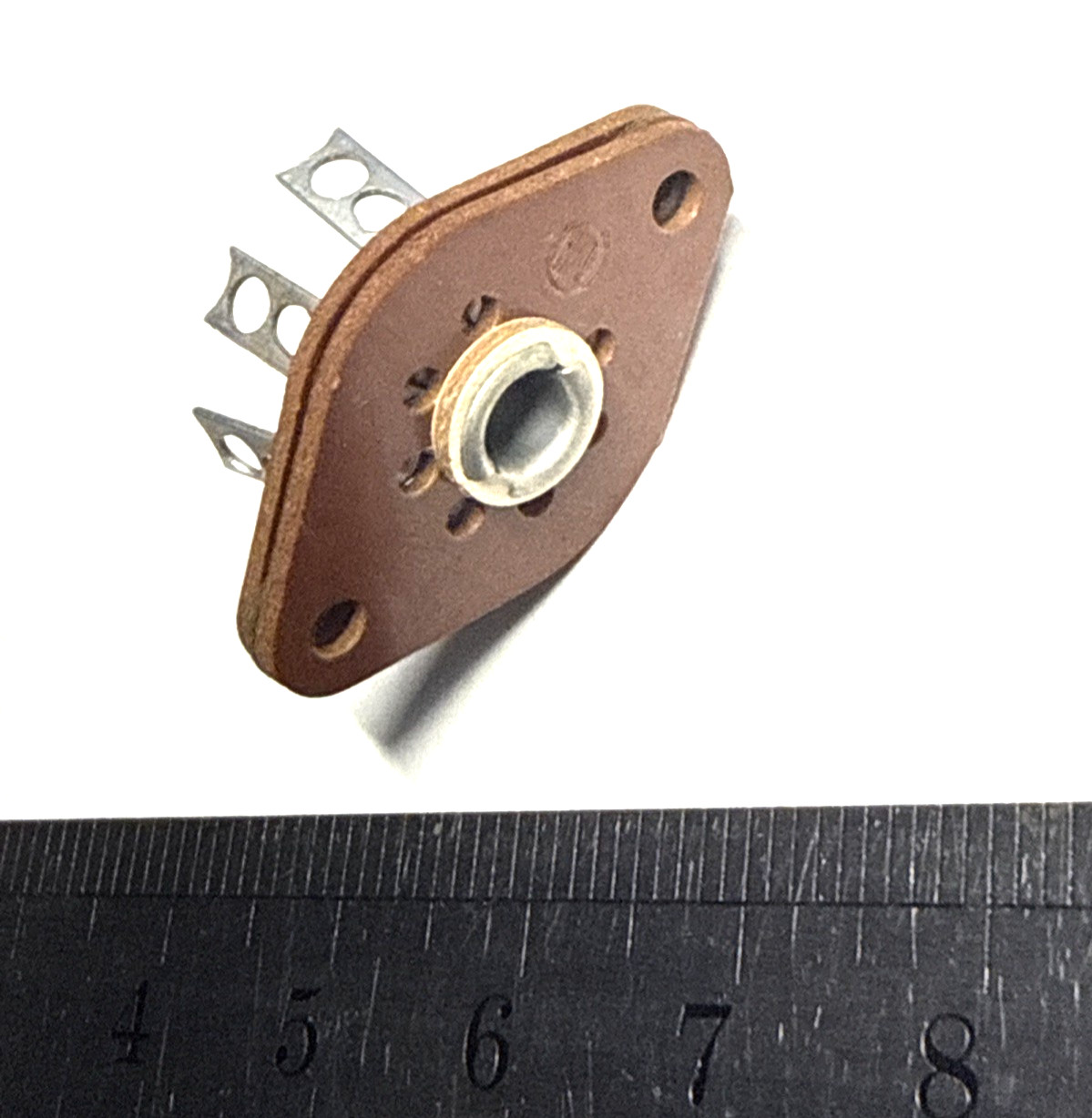 one 7 Pin Miniature Phenolic Wafer Tube Socket NOS bottom mount