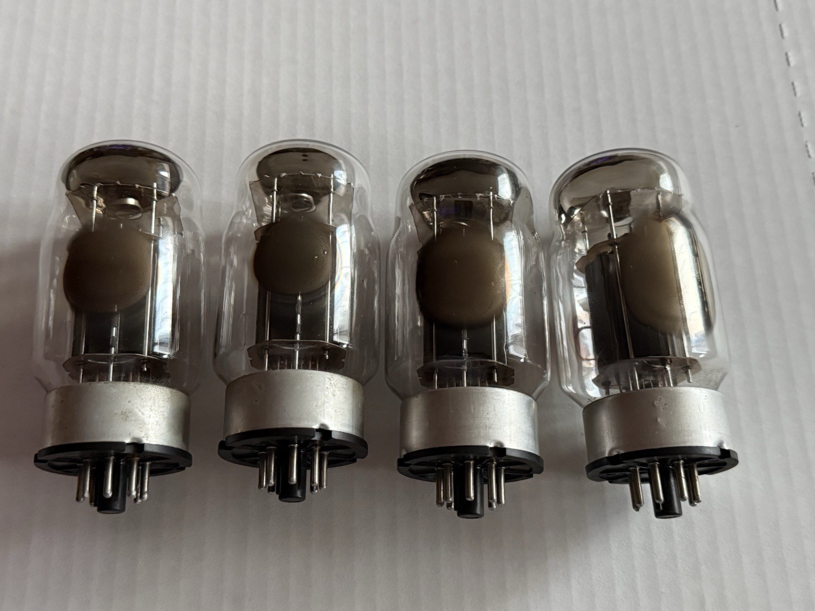 Set of 4 GEC KT88 Tubes. Test Good. Tested In Amp Also.