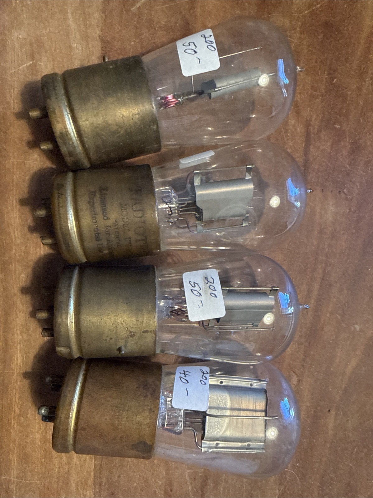 (4) RCA Radiotron UV-200,brass base, (3) tipped bulbs